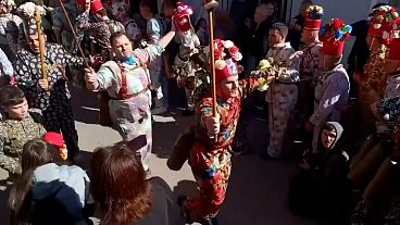 A dancer rings his bells during the Endiablada festival in Almonacid del Marquesado, Spain, 02.02.2025